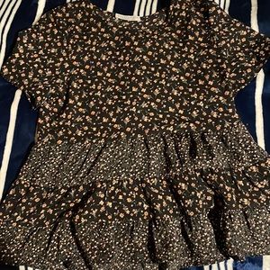 i am selling a blouse with a floral design